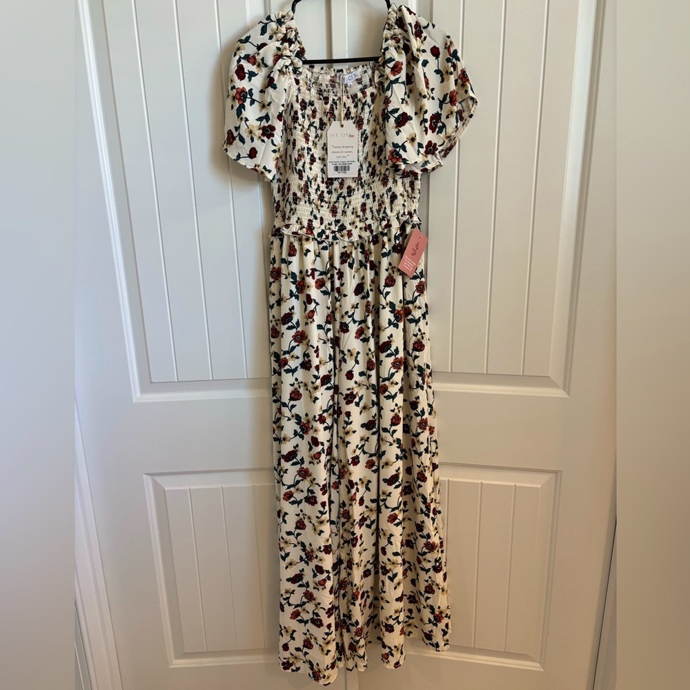 IVY CITY CO Floral jumpsuit with Puff Sleeves NWT